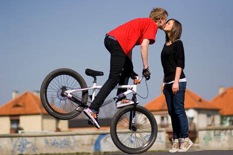 Kiss on Bicycle